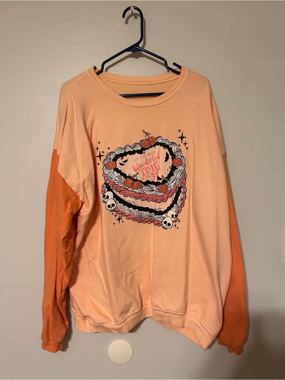 Women’s Halloween Pumpkin Skull Cale Graphic Sweatshirt - Peach/Orange